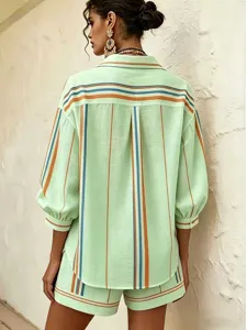 Detail shot of a 2026 elegant European women's striped 3/4 sleeve shirt and shorts set.