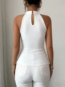 Top ajustado sin mangas para mujer en punto acanalado con cuello halter y abertura en espalda.