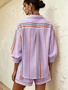 Detail view of the elegant purple striped shorts set, highlighting the chic design and fabric.