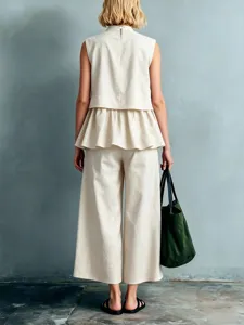 Top sans manches à volants et pantalon large ensemble pour femme été mode style.