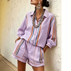 Elegant women's fashion 3/4 sleeve shirt and shorts set with stylish vertical stripes.