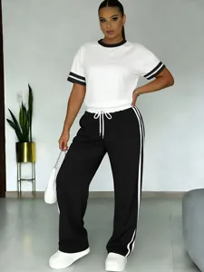 Dettagli del set sportivo casual da donna con t-shirt a maniche corte e comodi pantaloni lunghi.