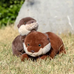 Cute simulation otter plush toy detail shot showcasing soft brown fur and lifelike facial features.