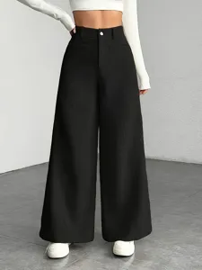 Close-up detail showcasing the premium ribbed texture and high-waisted fit of the casual trousers.