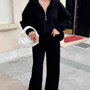 Casual black half-zip pullover hoodie and long pants two-piece set for women, autumn fashion.