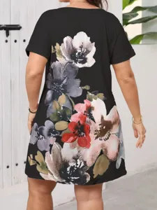 Women's black short sleeve A-line casual dress featuring elegant vintage floral print detail.
