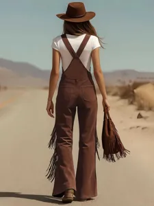 Vintage western suede fringe overall trousers detail view, showcasing back pockets and chic style.