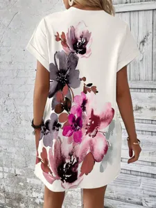 Detailed view of women's short-sleeve floral beach dress with vintage print and A-line cut.
