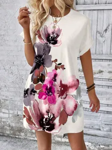 Detailed view of the women's short-sleeve casual floral print dress in a stylish setting.