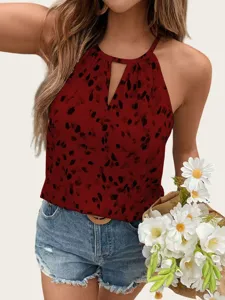 Women halter neck abstract print sleeveless top detail view showing key design features.