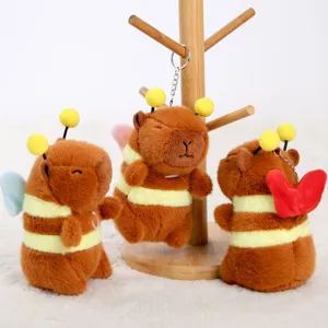Joli porte-clés en peluche capybara abeille avec ailes vibrantes, adorable pendentif de sac.