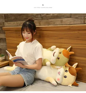 Cute cartoon cow plush long body pillow for bed, soft stuffed animal toy companion gift.