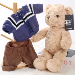 Cute plush teddy bear toy with knitted sweater and corduroy pants set for kids birthday gift.