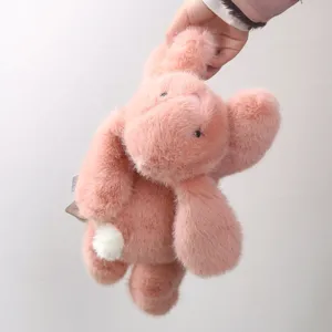 Coniglietto di peluche rosa con orecchie floppy animale imbottito morbido bambola compagna