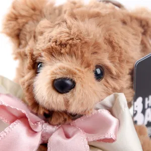 Cute brown teddy bear plush keychain with pink bow, soft fluffy bag pendant for daily use.