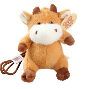 Cute cartoon bull plush toy pendant, soft stuffed animal bag charm for kids and gifting.