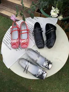 Women's classic Mary Jane flat shoes with double straps and cute bow design for spring.