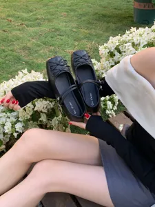 French bow Mary Jane shoes for women, stylish black flat ballet shoes with double straps.