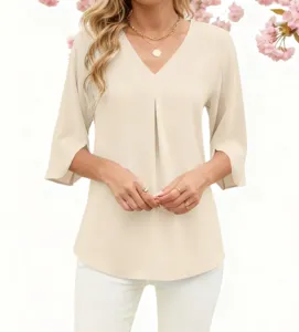 Blouse unie en mousseline col V avec manches 3/4 fendues, haut élégant pour femme de travail.