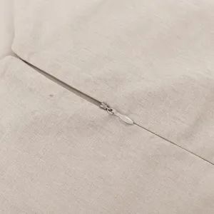 Close-up detail of women's casual cotton linen dress fabric showing hidden zipper design.