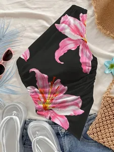 Detailed view of women summer one-shoulder floral print top with vibrant pink lily design.