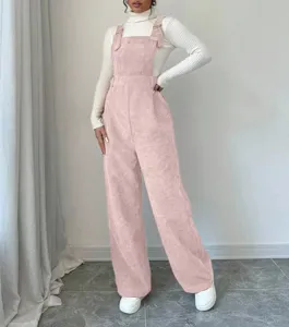 Pink corduroy overalls detail showcasing soft fabric texture and casual loose straight fit.