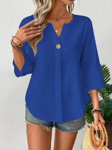 Close-up of women's V-neck 3/4 sleeve button blouse solid color casual loose fit shirt detail.