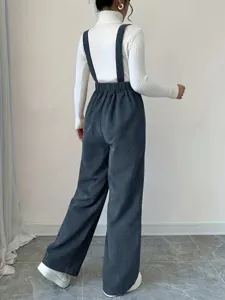 Corduroy suspender pants back view detail, loose casual wide leg trousers for women.