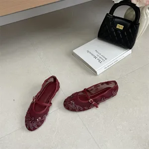 Women burgundy mesh flat shoes with elegant beaded floral embroidery and ankle strap closure.