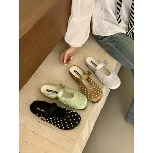Elegant satin pearl mules for women, featuring a chic pointed toe and comfortable slip-on design.