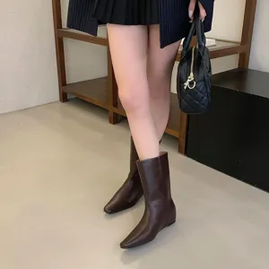 Detail view of women's brown square toe short boots, versatile elegant slip-on chelsea boots.