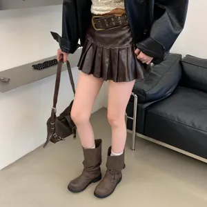 Vintage distressed mid-calf motorcycle boots for women, retro chunky heel booties with buckles.