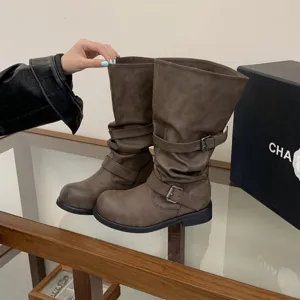 Retro distressed slouchy mid-calf motorcycle boots for women, chunky heel biker boots with buckle straps.