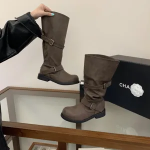 Vintage distressed brown knee high biker boots with double buckle and chunky heel for women
