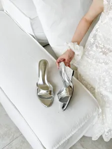 Chic metallic silver wedge high heel mules featuring an open-toe design for women summer fashion.