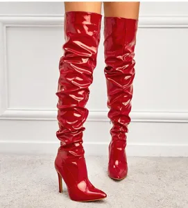 Red patent leather stiletto over-the-knee boots, pointed toe, sexy high heels for women.