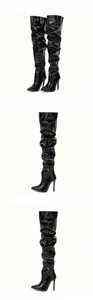 Black patent leather over-the-knee boots with stiletto heels and slouchy elastic design.