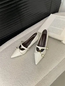 Elegant pointed toe kitten heels with double straps and chic French retro style for women.