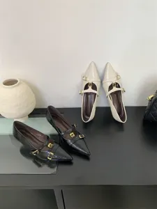 Elegant pointed toe kitten heels with chic metal buckle details for stylish office daily wear.