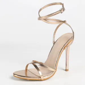 Champagne metallic high heel sandals with strap details, elegant stiletto for women detail view.