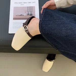 Retro square toe flat mule shoes for women with chic contrast strap and metal buckle detail.