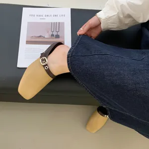 Retro square toe Mary Jane flat shoes detail shot, elegant low heel leather footwear for women.