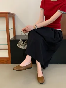 Detail view of vintage flat soft-soled women shoes with comfortable daily wear style.