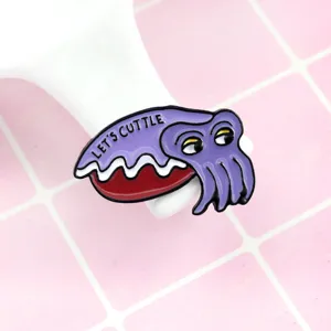 Cute anime cuttlefish enamel pin brooch with big eyes and funny text for marine lovers.