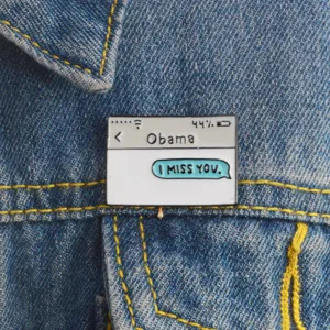 Creative enamel pin with phone text message design, trendy denim jacket metal badge accessory.