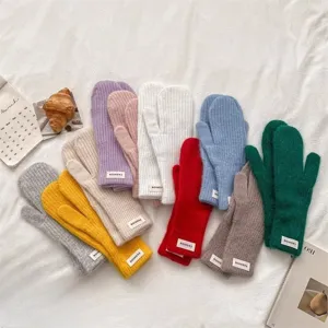 Winter warm knitted mittens for women, thick fuzzy solid color gloves for cold weather cycling.