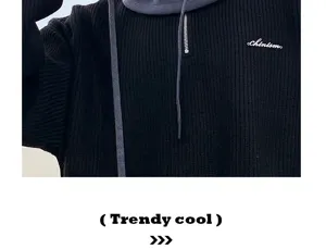 Detailed view of black knitted thermal hoodie sweater with zipper and chest embroidery.