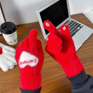 Red plush knit gloves for women, winter warm thick cozy mittens with heart pattern detail.