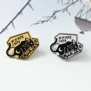Detailed view of enamel cat brooches featuring a funny meme design in gold and silver finishes.