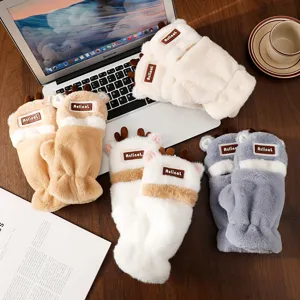 Detailed close-up shot of cute plush deer antler gloves with convertible half-finger design.